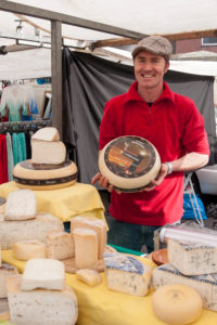 Weekly market on the Dapperstraat, Dapperbuurt, stand for organic cheese, Amsterdam, Holland, Netherlands Weekly market on the Dapperstraat, Dapperbuurt, stand for organic cheese, Amsterdam, Holland, Netherlands